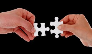 Puzzle pieces being connected