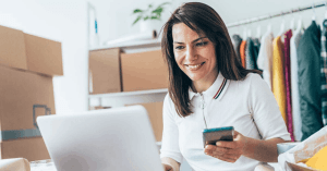 A virtual assistant working in her laptop and phone